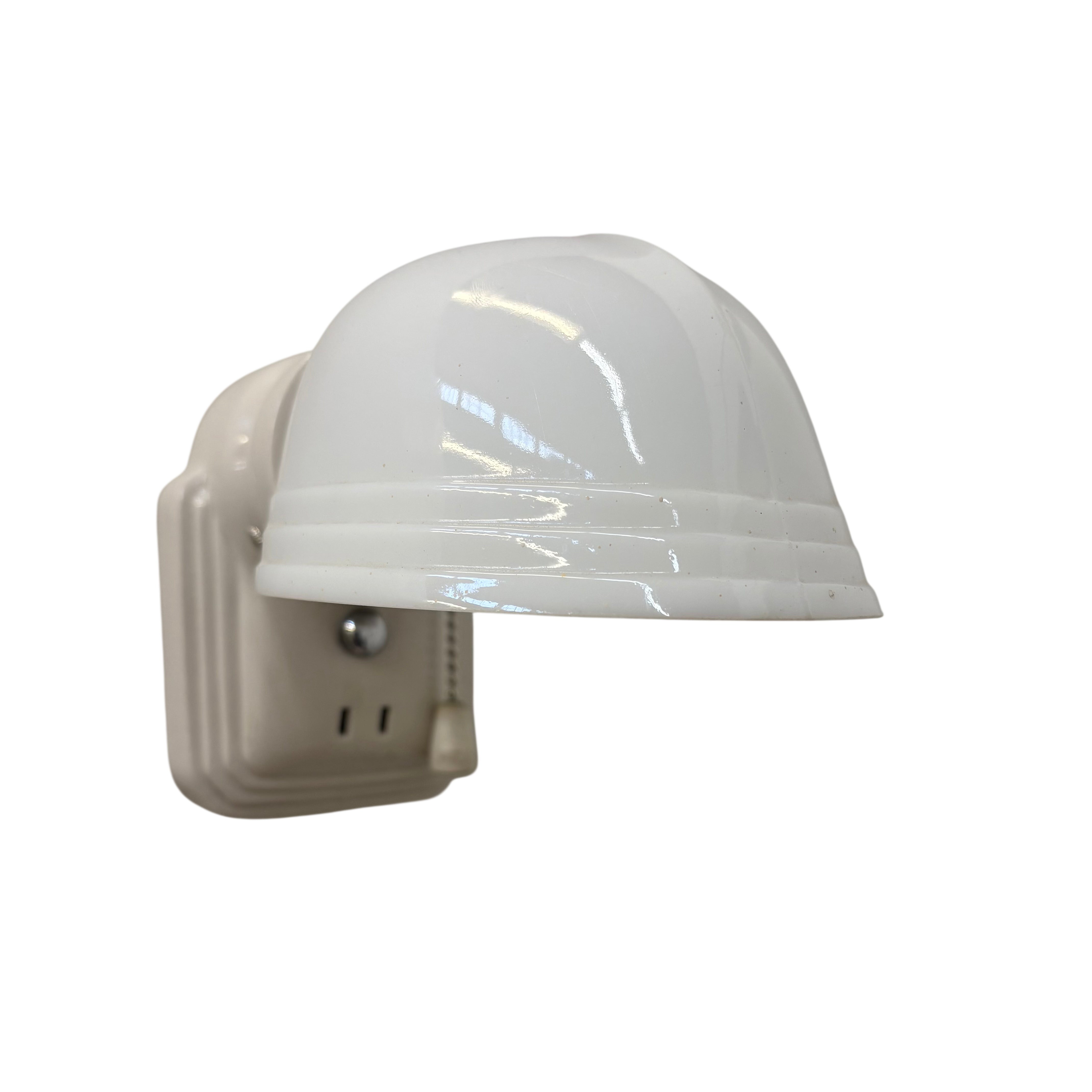 White porcelain sconce with shade and outlet on a white background