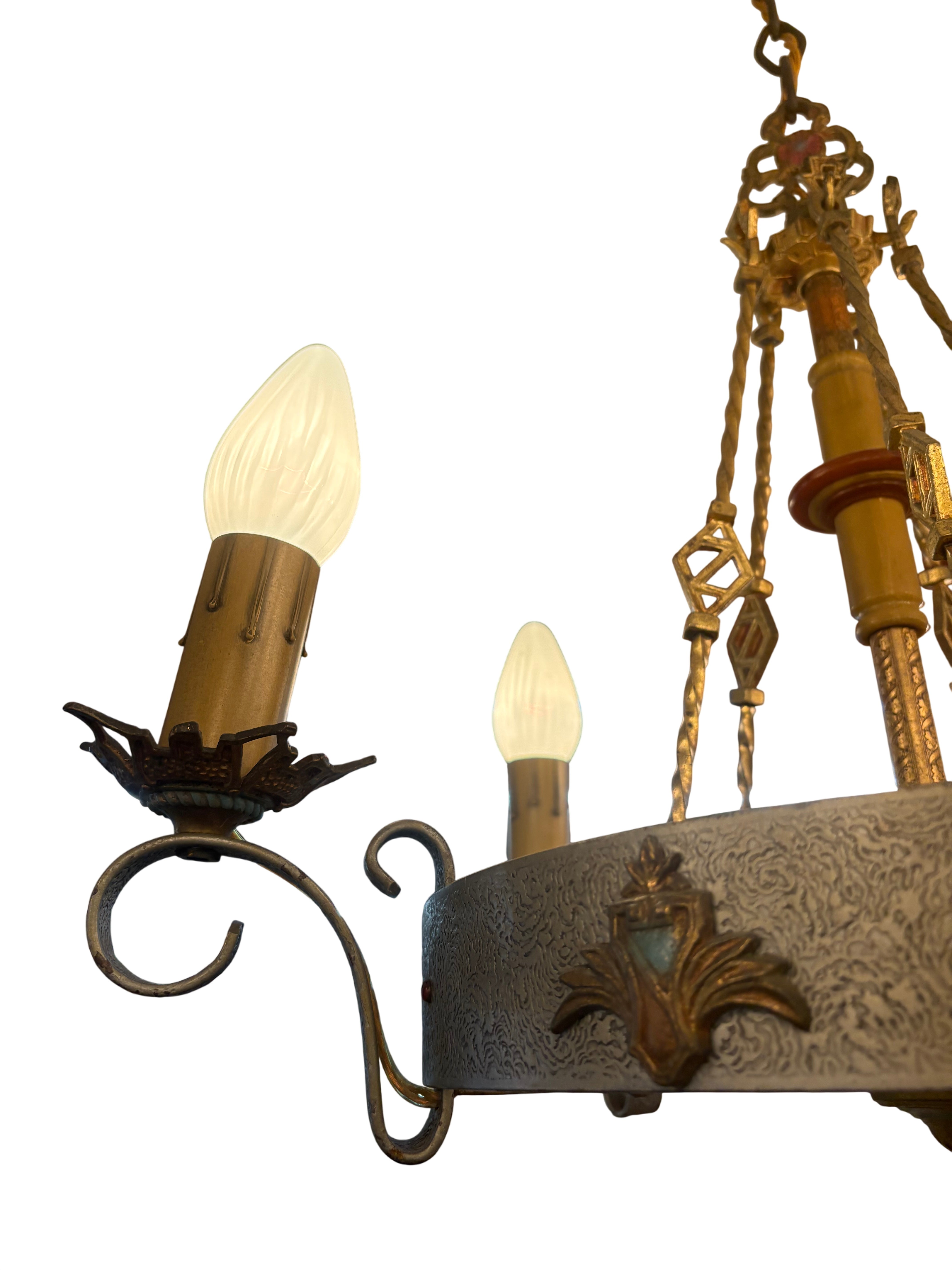 Decorative chandelier with lit light bulbs in a room setting