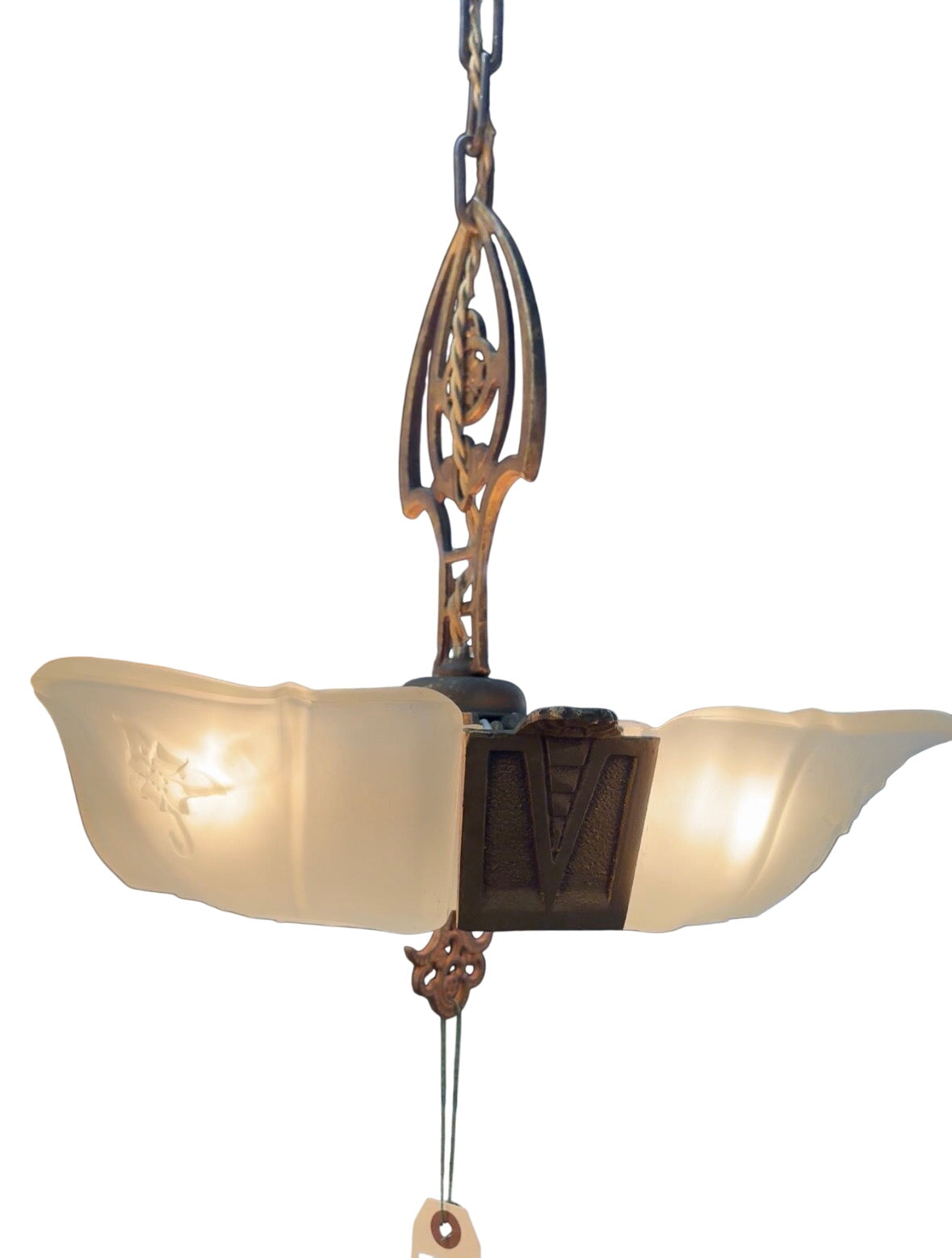 Vintage-style chandelier with frosted glass shades hanging from a ceiling.