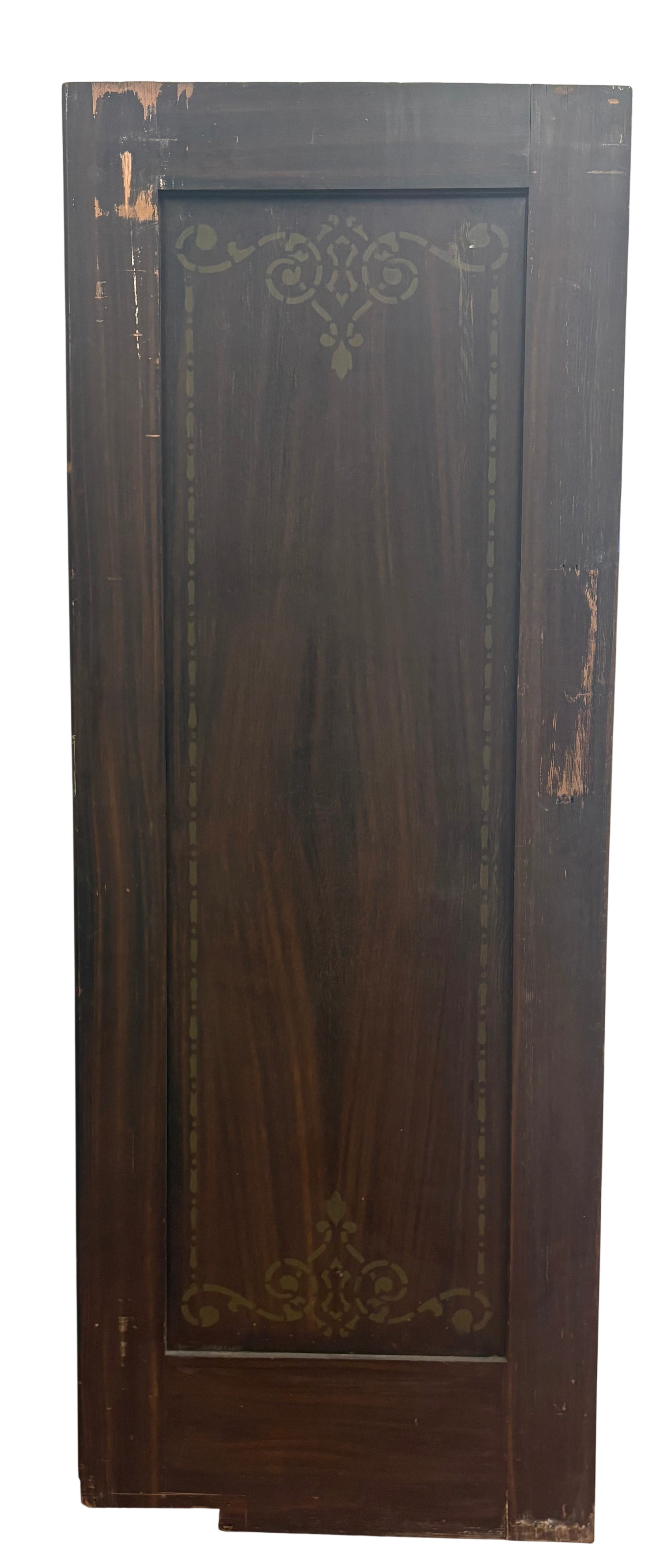 Dark wooden panel with decorative carvings on a white background