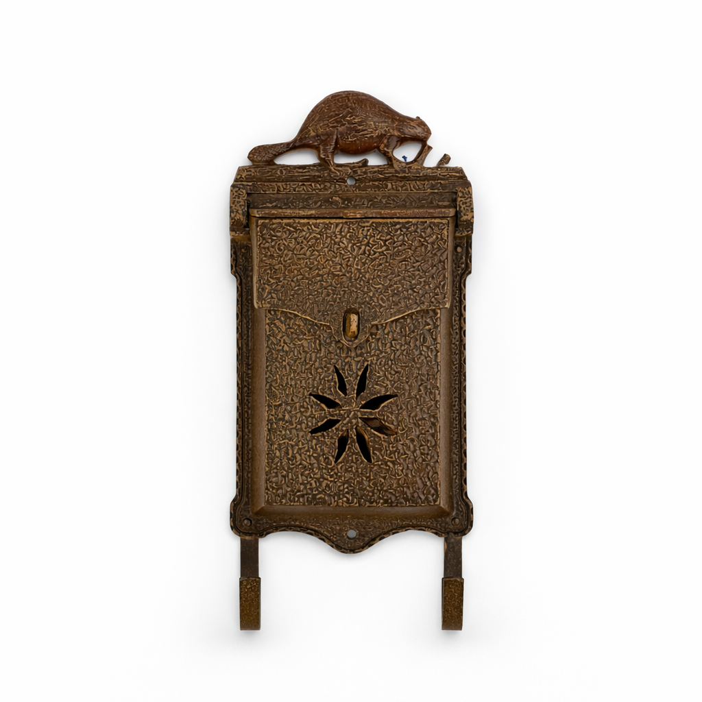 Decorative metal wall mailbox with a beaver design on a white background