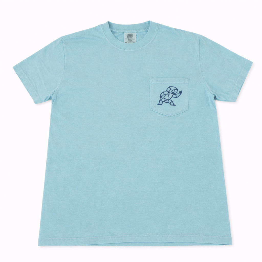 Light blue t-shirt with a small graphic on the chest pocket against a white background