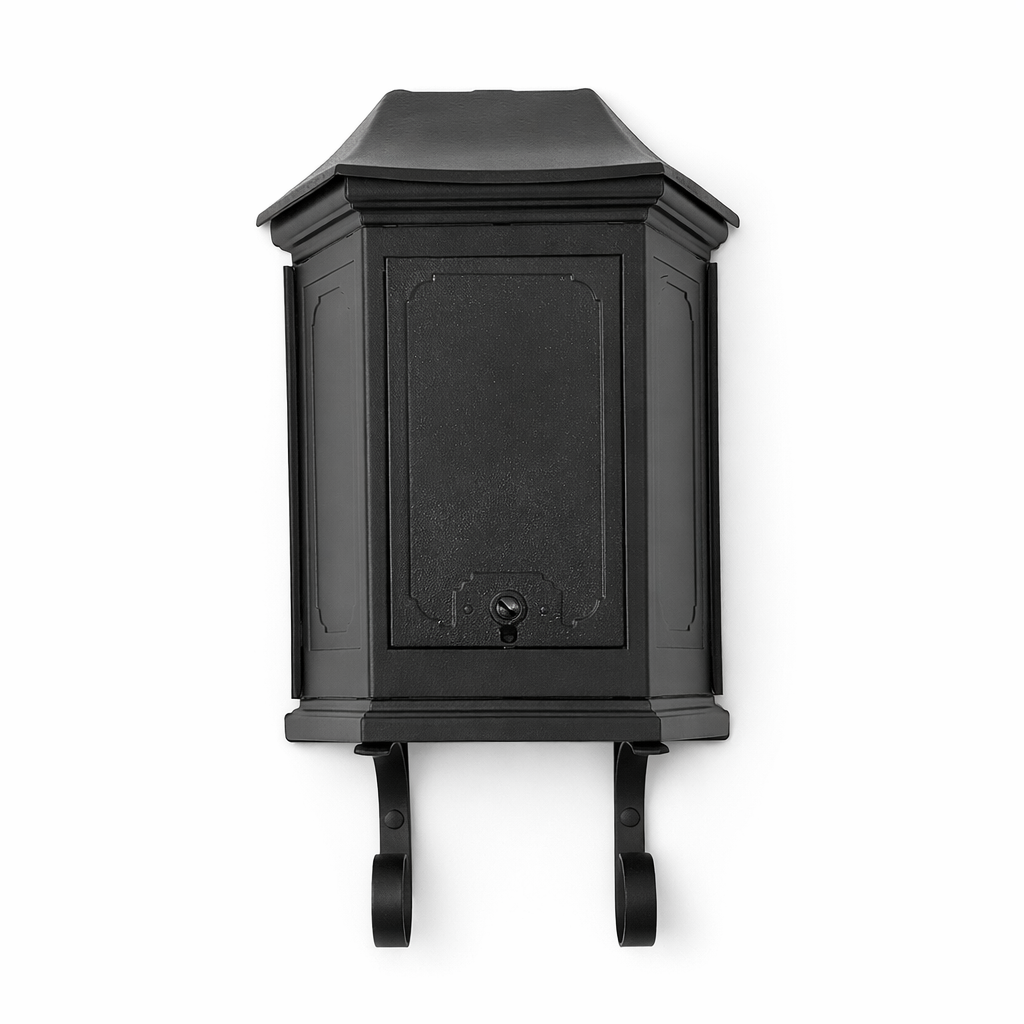 Black wall-mounted mailbox with decorative brackets on a white background