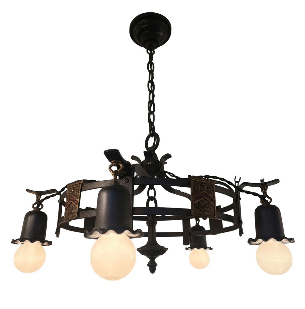 Spanish Revival style chandelier with hand-worked iron frame and milk glass globe shades, 1920s–1930s.Chandelier (LT- 1117)