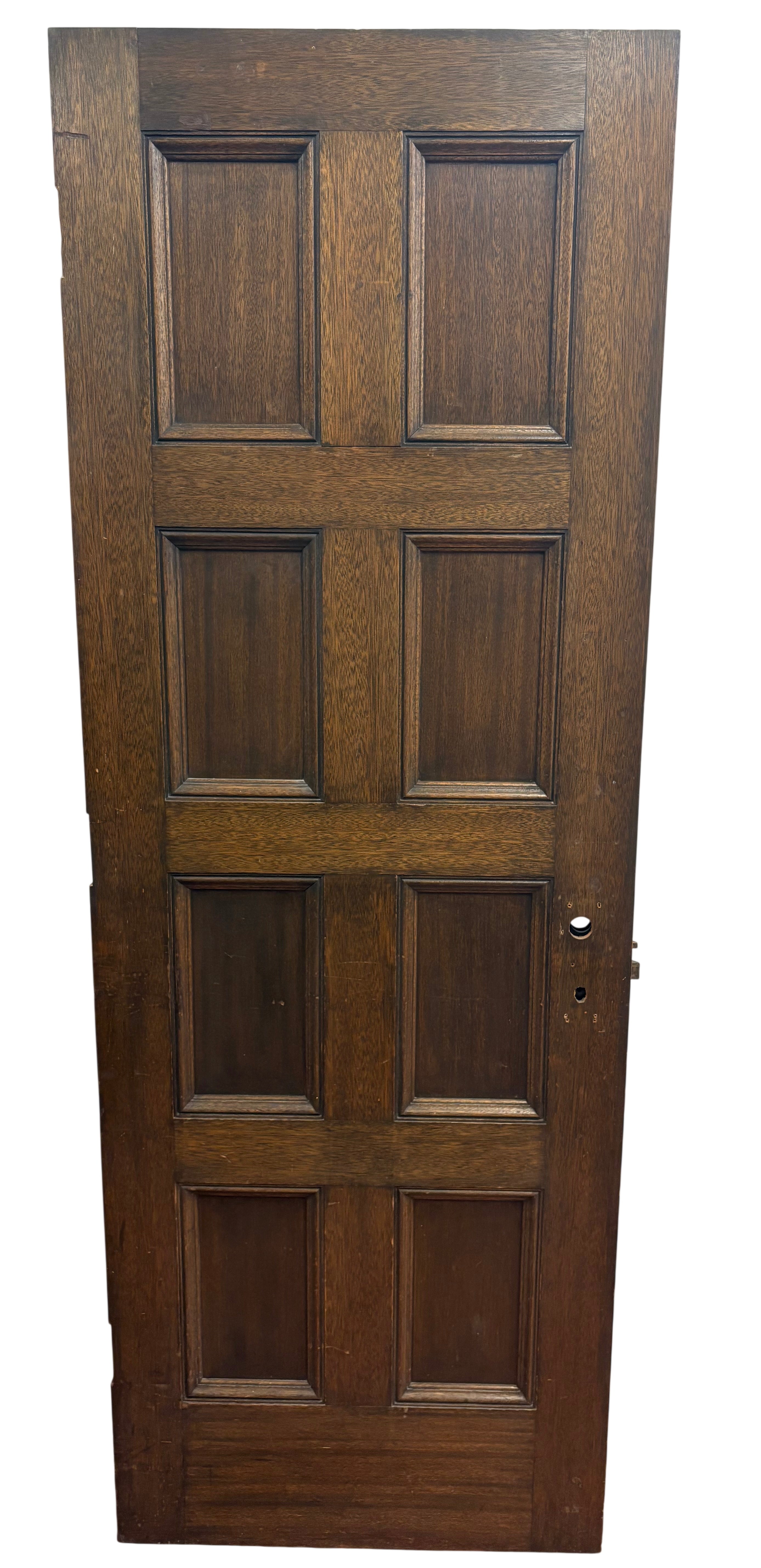 Wooden door with panel design on a white background