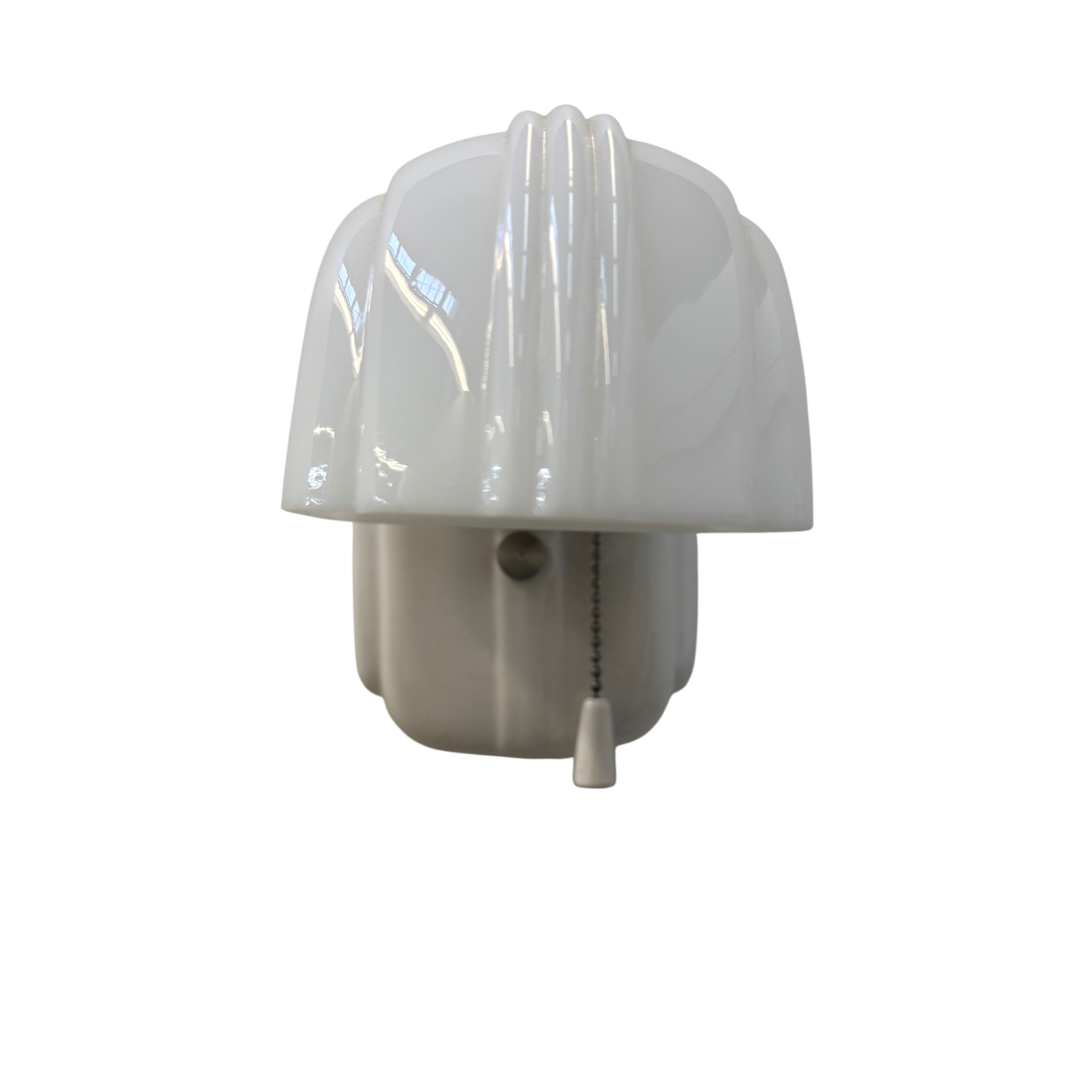 White porcelain sconce with shade on a white background