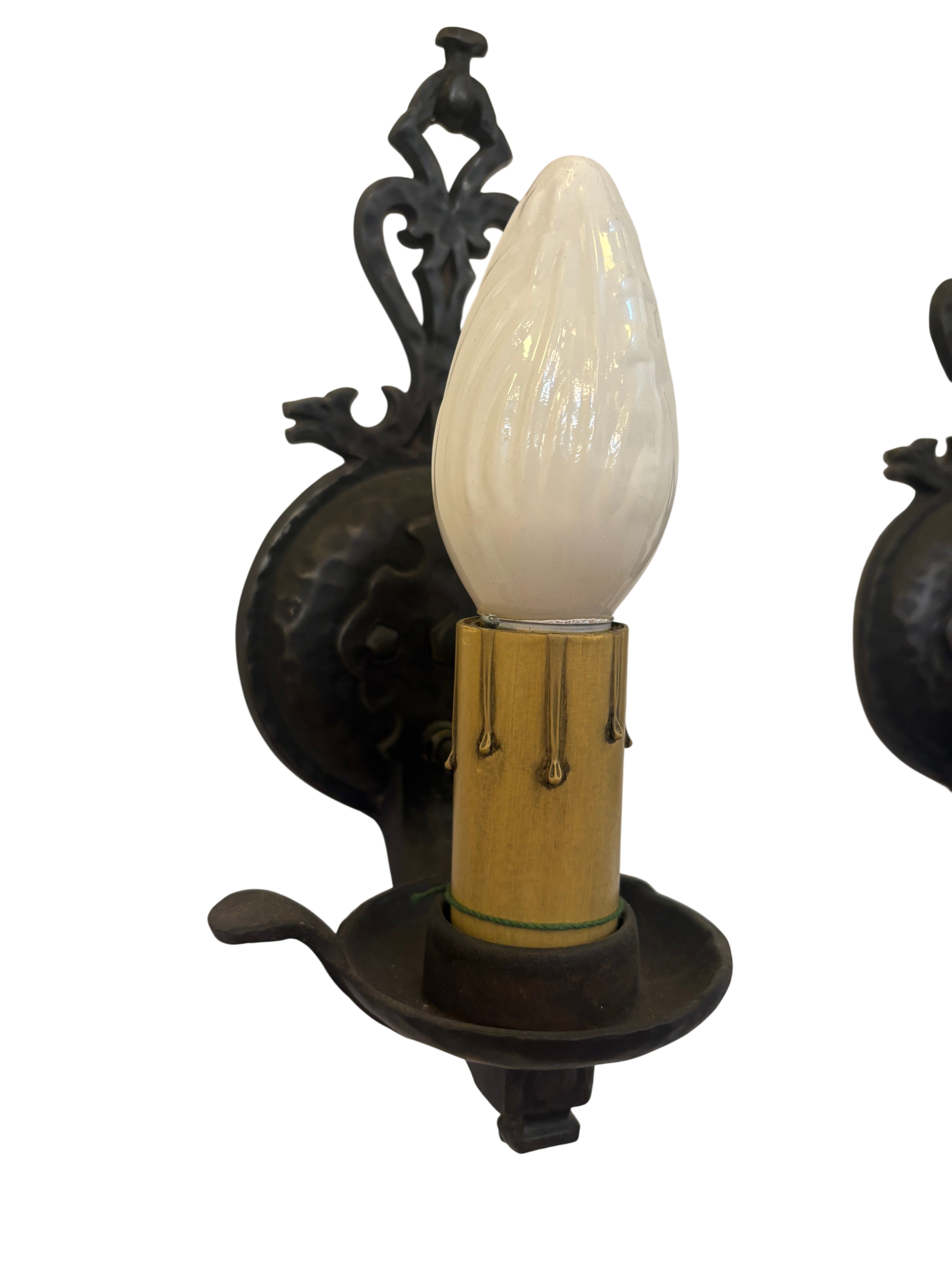 Decorative wall sconce with a white bulb on a white background
