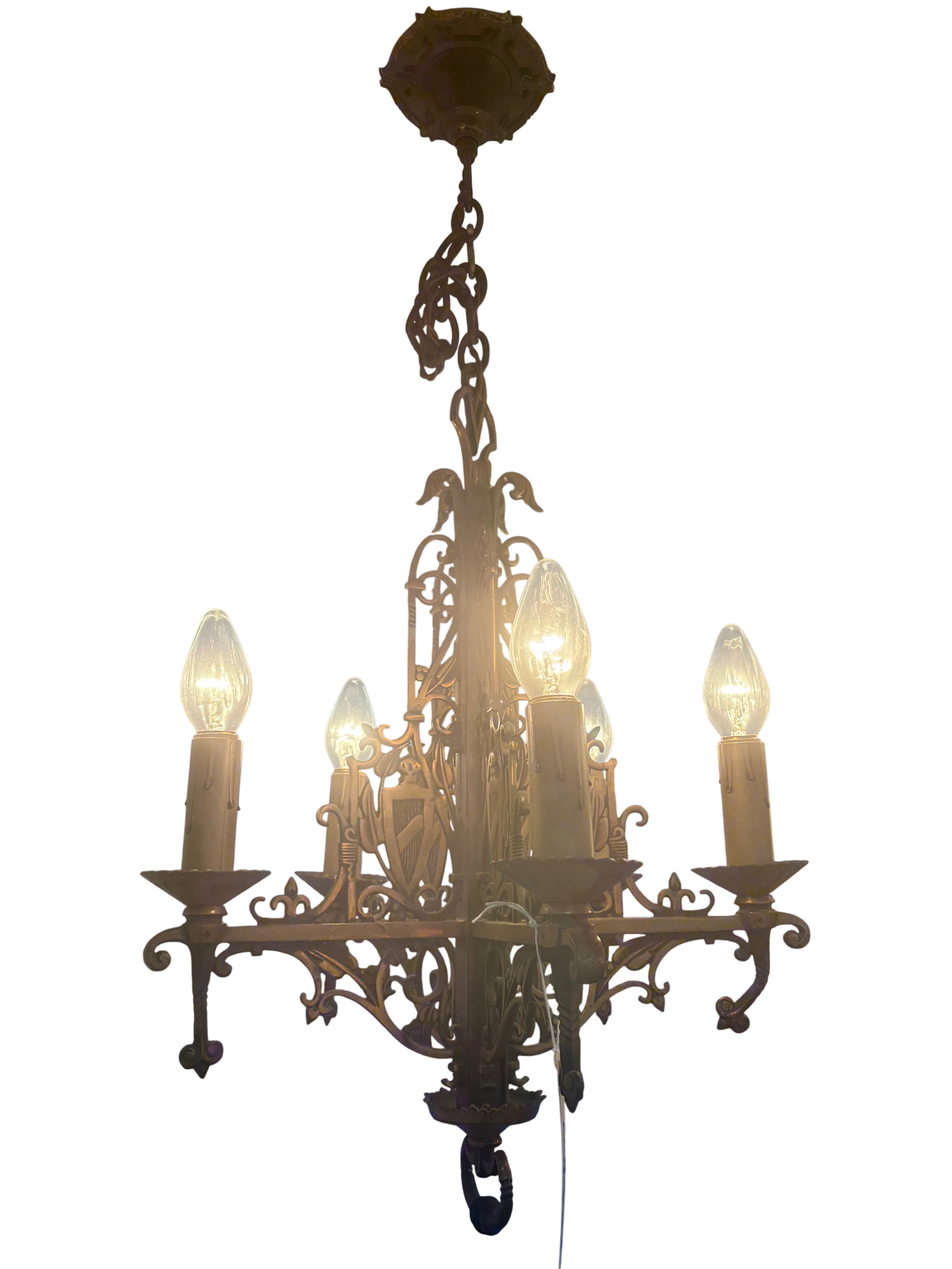 Vintage-style chandelier with five lights on a white background
